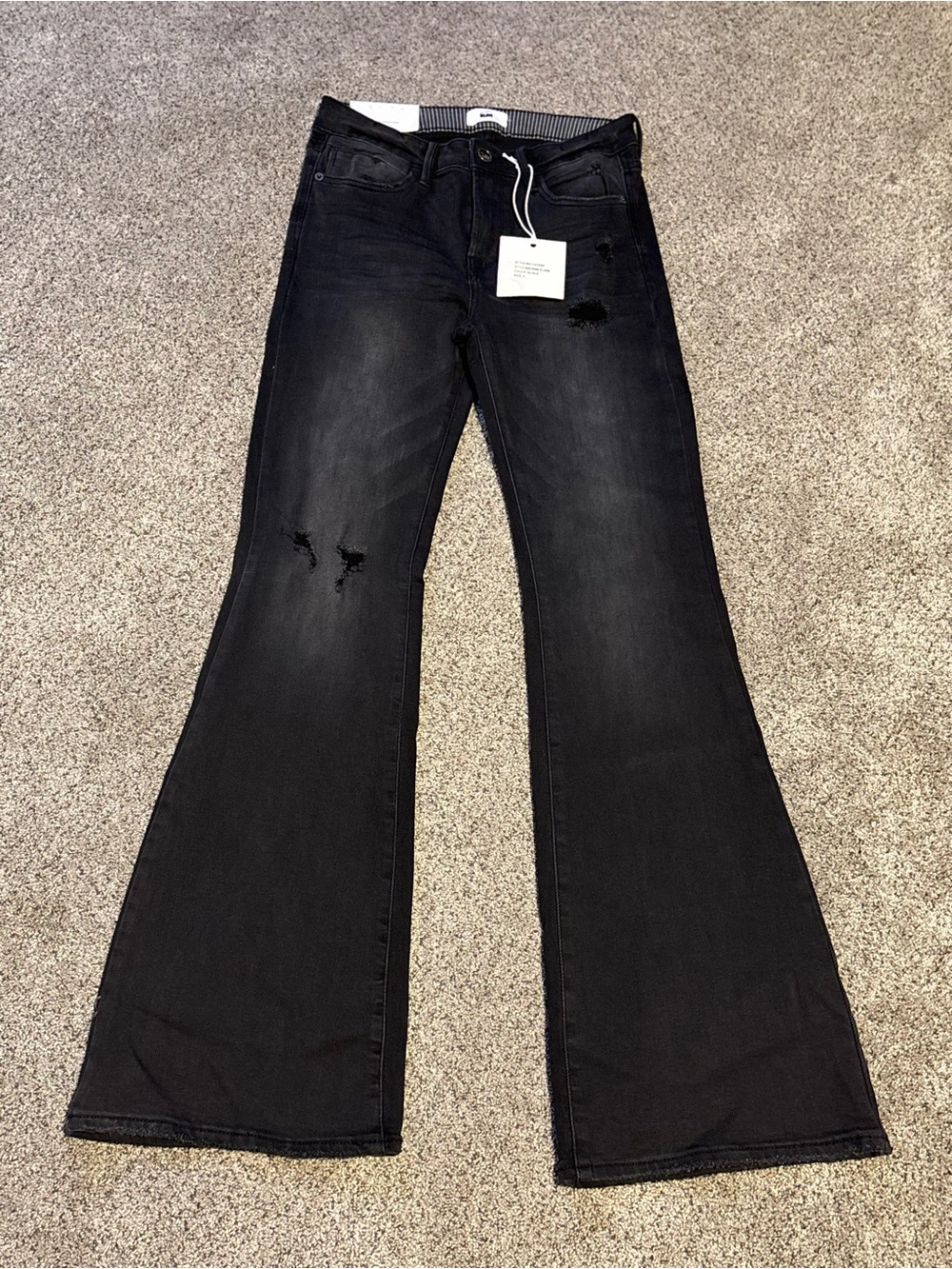 Signature Black Flare Jeans with Distressed Knees